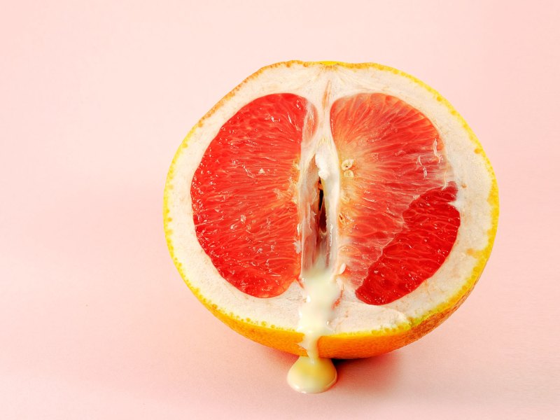Symbolbild für Orgasmus, Grapefruit mit Saft