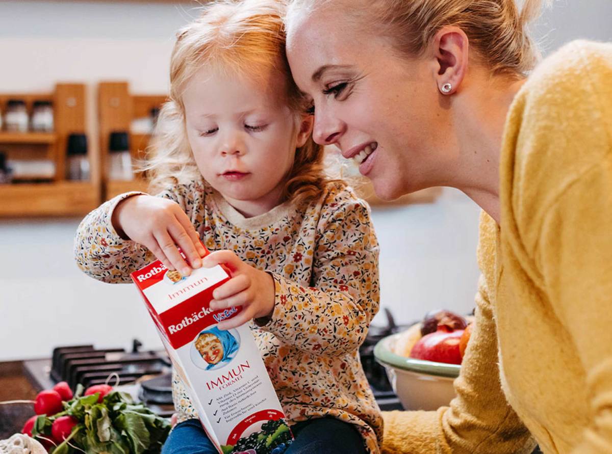 Produkt Moodbild Rotbäckchen Mutter mit Kind