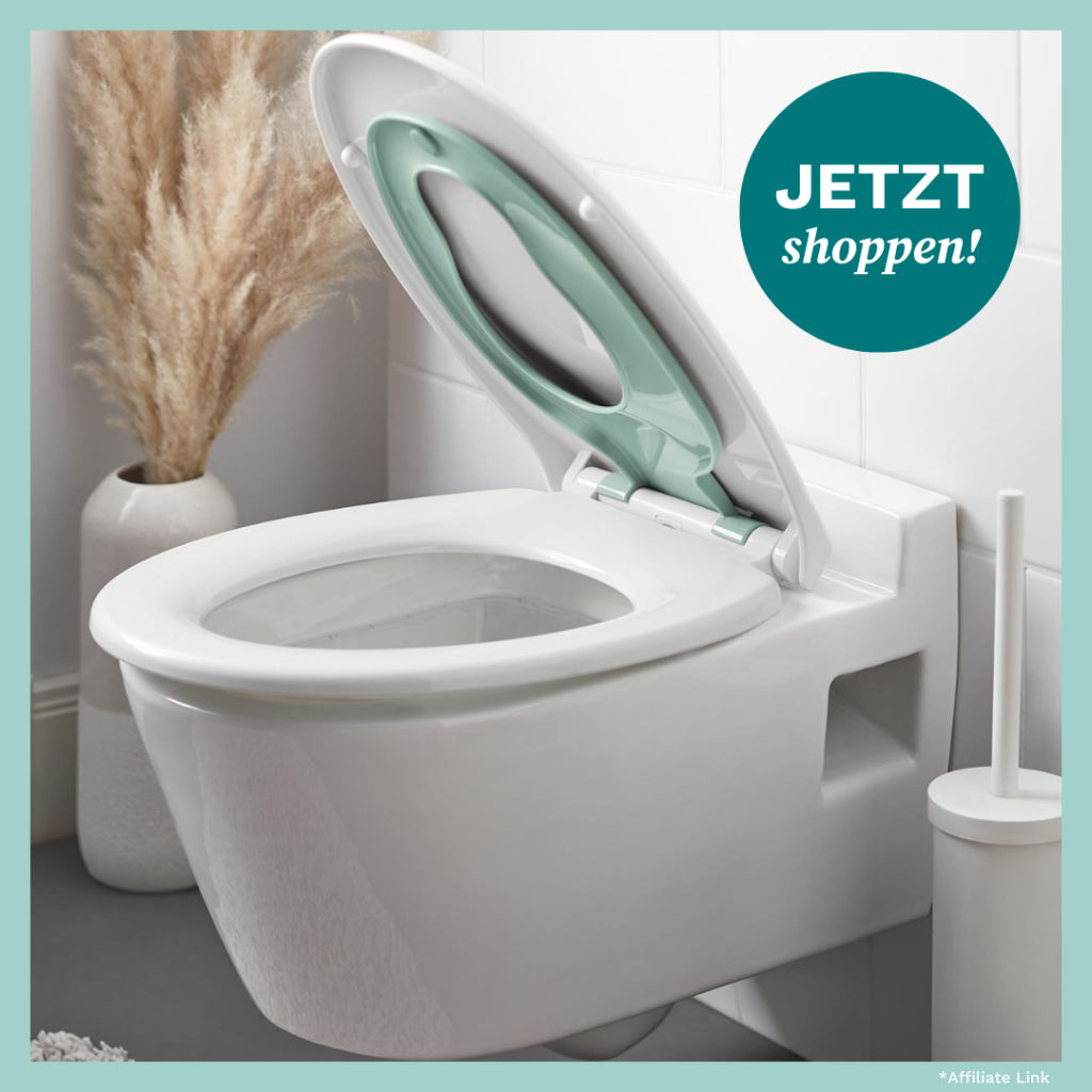 WC-Sitz mit integriertem Kinder-Toilettensitz von Tchibo.